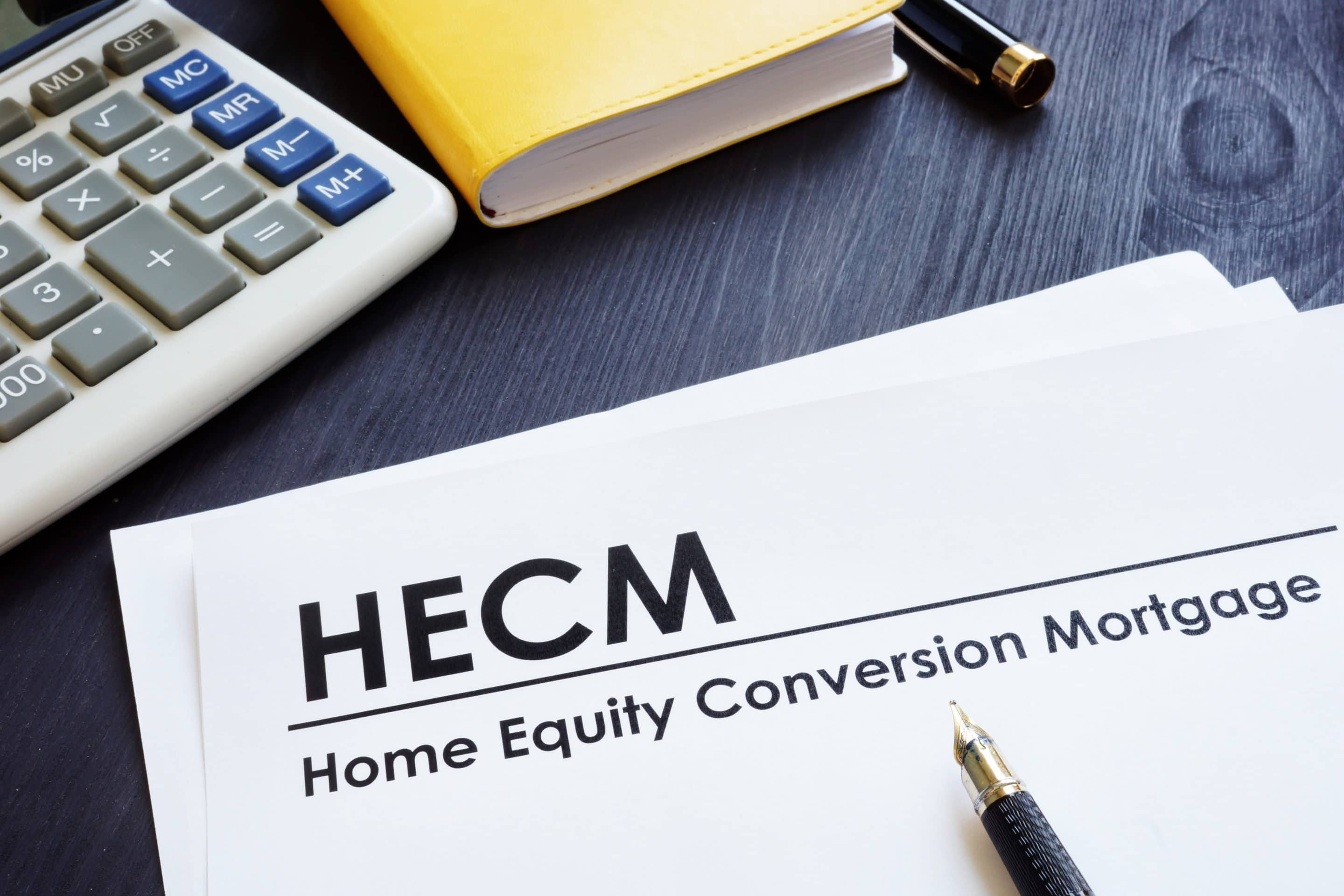 a piece of paper that says "HECM Home Equity Conversion Mortgage"